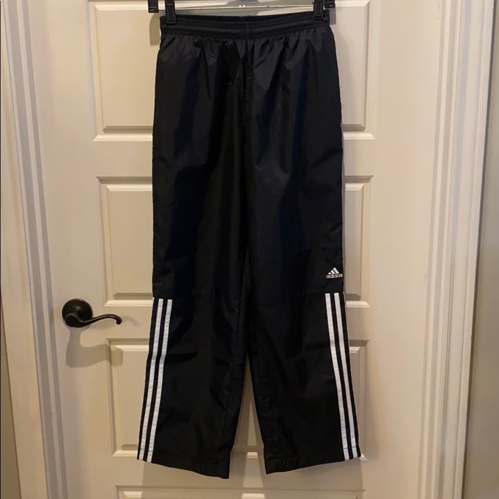 Adidas black with white stripe, wind pant.